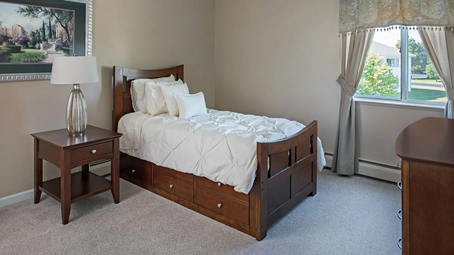 Bedroom with a view at American House convalescent home in South Sterling Heights, MI